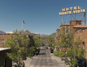 The bright yellow rooftop sign at Hotel Monte Vista in Flagstaff, Arizona