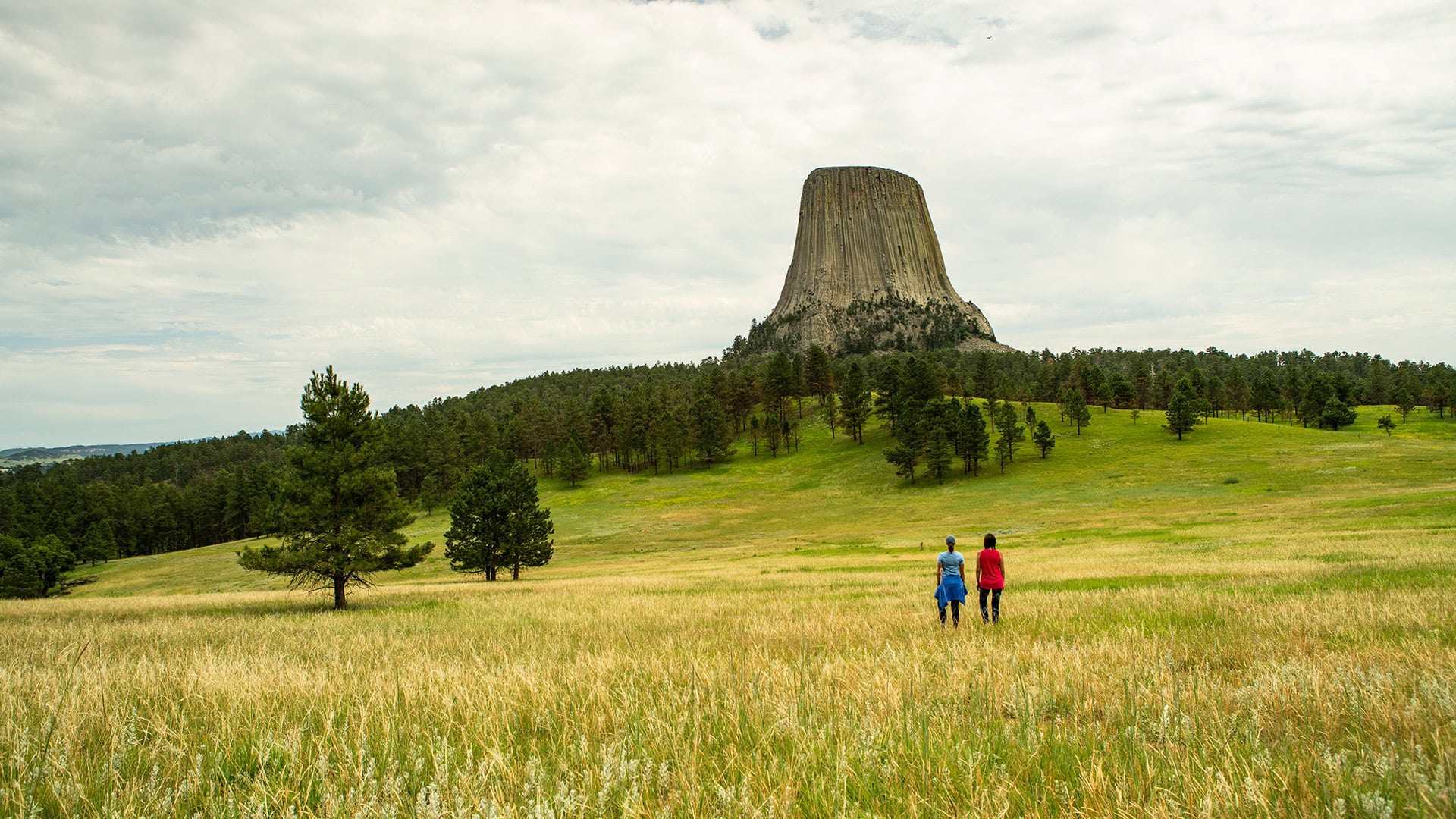 Hikers at Devils Tower National Monument in Wyoming
