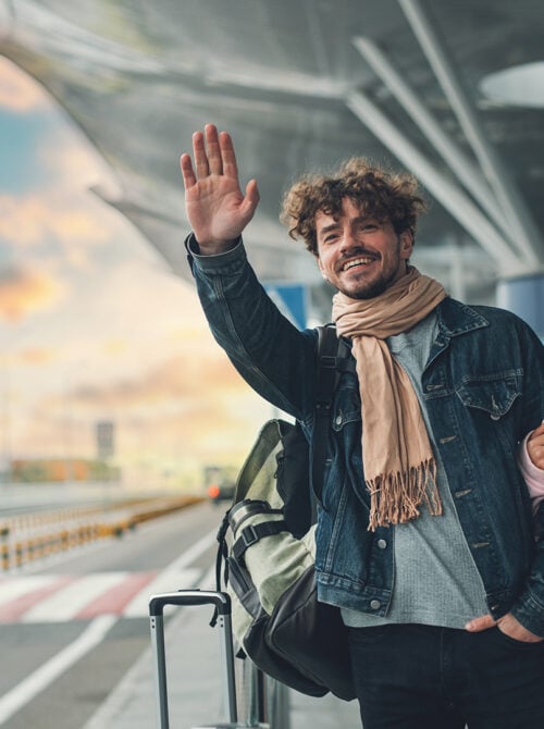 Couple at an airport hailing a ride